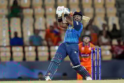 Charith Asalanka hits a boundary against Netherlands